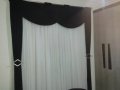 Persiana vertical com  bando no varão