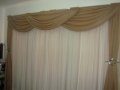 Cortinas de voil com forro e bando no varão